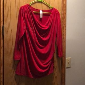 Red blouse with mini gold accents.